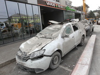 A crushed car is near a hotel destroyed by the Russian ballistic missile attack late on Monday, August 26, that claims the lives of two peop...