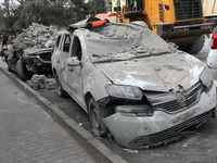 A crushed car is near a hotel destroyed by the Russian ballistic missile attack late on Monday, August 26, that claims the lives of two peop...