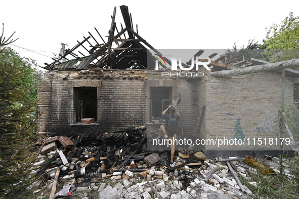 A house is damaged after a Russian Shahed drone falls onto a residential area in Zaporizhzhia, Ukraine, on August 27, 2024. NO USE RUSSIA. N...