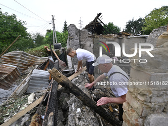 A house is damaged after a Russian Shahed drone falls onto a residential area in Zaporizhzhia, Ukraine, on August 27, 2024. NO USE RUSSIA. N...