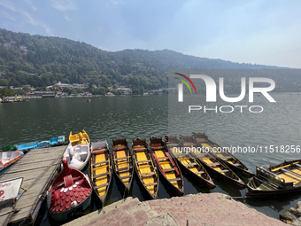 Boats moor along Naini Lake (Naini Tal) in Nainital, Uttarakhand, India, on April 21, 2024. (