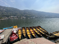 Boats moor along Naini Lake (Naini Tal) in Nainital, Uttarakhand, India, on April 21, 2024. (