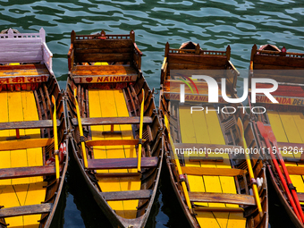 Boats moor along Naini Lake (Naini Tal) in Nainital, Uttarakhand, India, on April 21, 2024. (