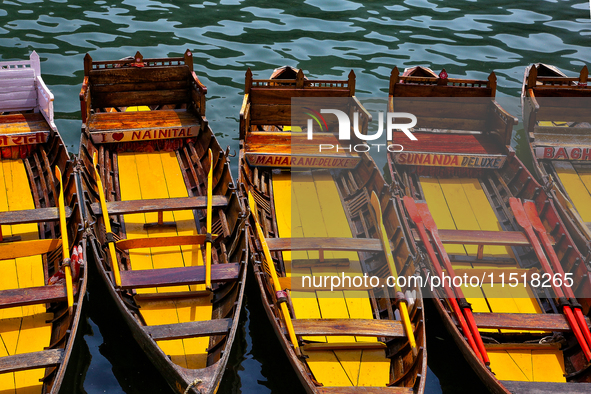 Boats moor along Naini Lake (Naini Tal) in Nainital, Uttarakhand, India, on April 21, 2024. 