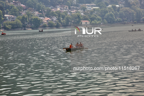 Boats are along Naini Lake (Naini Tal) in Nainital, Uttarakhand, India, on April 21, 2024. 