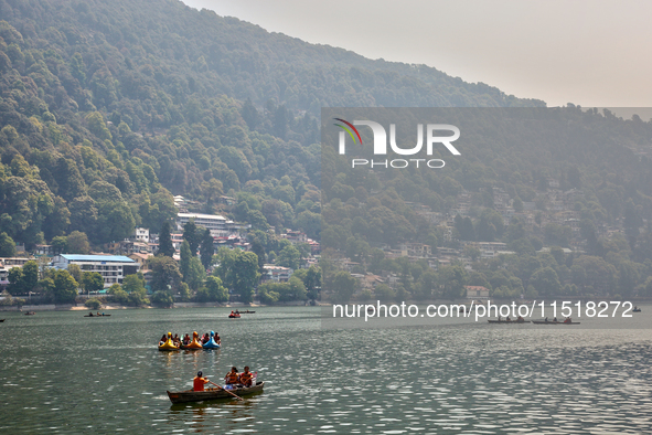 Boats are along Naini Lake (Naini Tal) in Nainital, Uttarakhand, India, on April 21, 2024. 