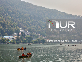 Boats are along Naini Lake (Naini Tal) in Nainital, Uttarakhand, India, on April 21, 2024. (