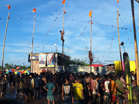 Youths participate in the Dadhi-Kando game organized at Paghalupara near Sahudangi on the outskirts of Siliguri, India, on August 27, 2024,...