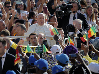 Pope Francis waves at the faithful during the weekly General Audience in Saint Peter's Square in Vatican City on August 28, 2024. (