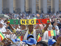 A pilgrim from Senegal attends Pope Francis's weekly general audience in Saint Peter's Square, Vatican City, on August 28, 2024. (