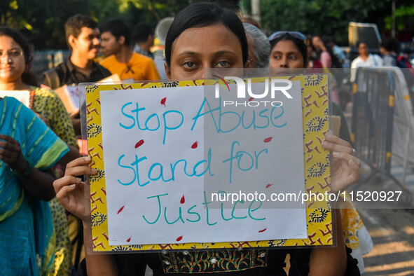 Citizens participate in a protest rally in Kolkata, India, on August 28, 2024, against the rape and murder of a second-year PGT doctor at RG...