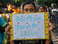 Citizens participate in a protest rally in Kolkata, India, on August 28, 2024, against the rape and murder of a second-year PGT doctor at RG...