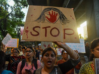 Citizens participate in a protest rally in Kolkata, India, on August 28, 2024, against the rape and murder of a second-year PGT doctor at RG...