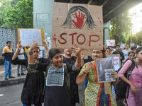 Citizens participate in a protest rally in Kolkata, India, on August 28, 2024, against the rape and murder of a second-year PGT doctor at RG...