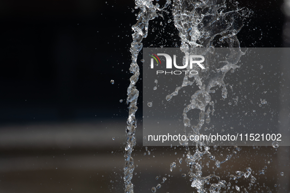 Water from a fountain is seen at Harry Blum Square in Cologne, Germany, on August 28, 2024. 