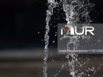 Water from a fountain is seen at Harry Blum Square in Cologne, Germany, on August 28, 2024. (