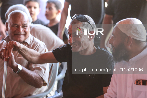 Qaid Farhan Alkadi, a Bedouin Israeli hostage who is kidnapped in the deadly October 7 Hamas attack, is greeted by his friends and family af...