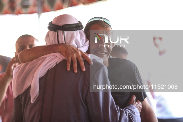 Qaid Farhan Alkadi, a Bedouin Israeli hostage who is kidnapped in the deadly October 7 Hamas attack, is greeted by his friends and family af...