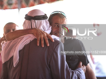 Qaid Farhan Alkadi, a Bedouin Israeli hostage who is kidnapped in the deadly October 7 Hamas attack, is greeted by his friends and family af...