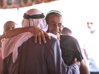 Qaid Farhan Alkadi, a Bedouin Israeli hostage who is kidnapped in the deadly October 7 Hamas attack, is greeted by his friends and family af...