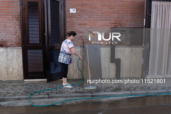 The residents of San Felice a Cancello, in the province of Caserta, deal with the aftermath of the mudslide and water that pour into the tow...