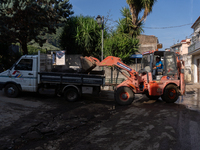 The residents of San Felice a Cancello, in the province of Caserta, deal with the aftermath of the mudslide and water that pour into the tow...