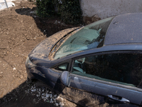 The residents of San Felice a Cancello, in the province of Caserta, deal with the aftermath of the mudslide and water that pour into the tow...