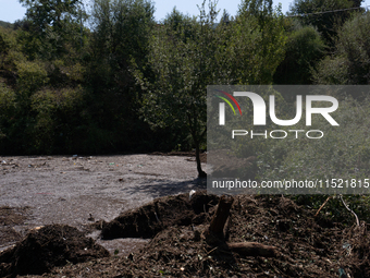 The residents of San Felice a Cancello, in the province of Caserta, deal with the aftermath of the mudslide and water that pour into the tow...