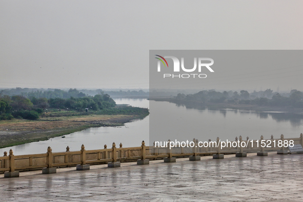 The Yamuna River is seen from the Taj Mahal complex in Agra, Uttar Pradesh, India, on May 5, 2022. 