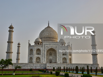 The Taj Mahal is seen just before sunrise in Agra, Uttar Pradesh, India, on May 5, 2022. (