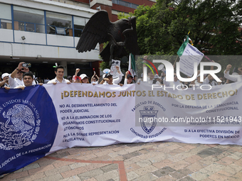 Students and workers of the Faculty of Law of the UNAM protest on August 28, 2024, at the University City facilities in Mexico City, Mexico,...