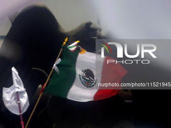 Students and workers of the Faculty of Law of the UNAM wave flags of Mexico in Ciudad Universitaria, Mexico, on August 28, 2024, to protest...