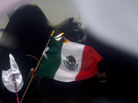 Students and workers of the Faculty of Law of the UNAM wave flags of Mexico in Ciudad Universitaria, Mexico, on August 28, 2024, to protest...