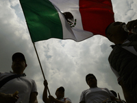 Students and workers of the Faculty of Law of the UNAM wave flags of Mexico in Ciudad Universitaria, Mexico, on August 28, 2024, to protest...