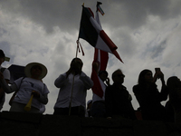 Students and workers of the Faculty of Law of the UNAM wave flags of Mexico in Ciudad Universitaria, Mexico, on August 28, 2024, to protest...