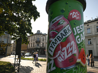 KRAKOW, POLAND - AUGUST 28:
An ad for Tymbark refreshment drink is displayed in Podgorze's Market Square as Southern Poland and Krakow face...