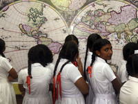 Sri Lankan school children watch a replica World Map by Johannes van Loon in Negombo, Sri Lanka, on August 29, 2024. Johannes van Loon (circ...