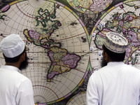 Sri Lankan Muslims watch a replica World Map by Johannes van Loon in Negombo, Sri Lanka, on August 29, 2024. Johannes van Loon (circa 1611-1...