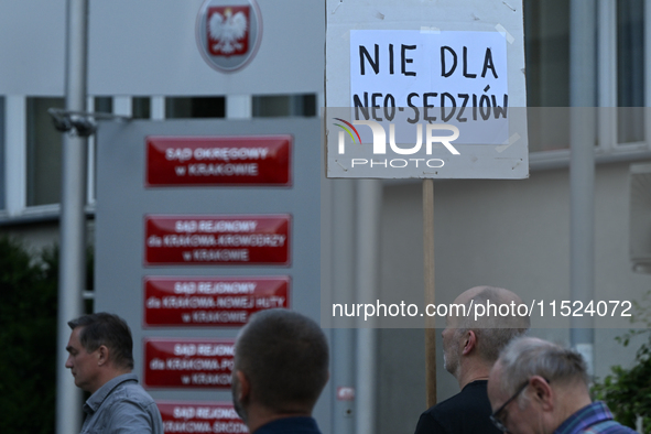 KRAKOW, POLAND - AUGUST 28:
reading 'Tusk, you have failed' as members of the KOD (Committee for the Defense of Democracy) protest outside t...