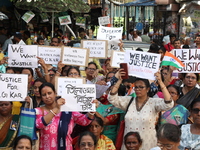 Women participate in ''Journey of Commitment'' during a protest march against the rape and murder of a PGT woman doctor at Government-run R...