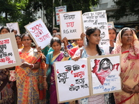 Women participate in ''Journey of Commitment'' during a protest march against the rape and murder of a PGT woman doctor at Government-run R...