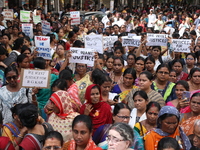 Women participate in ''Journey of Commitment'' during a protest march against the rape and murder of a PGT woman doctor at Government-run R...