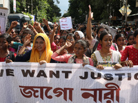 Women participate in ''Journey of Commitment'' during a protest march against the rape and murder of a PGT woman doctor at Government-run R...