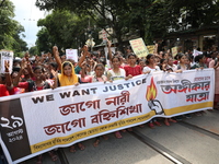 Women participate in ''Journey of Commitment'' during a protest march against the rape and murder of a PGT woman doctor at Government-run R...