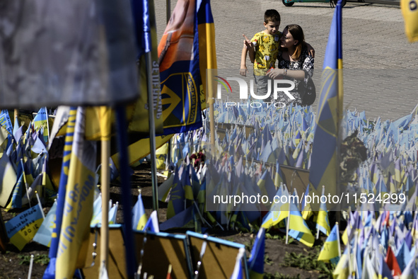 Ukrainians honor the memory of fallen soldiers on the Day of Remembrance of Ukraine's Defenders, amid Russia's attack on Ukraine, at Indepen...