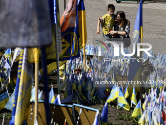 Ukrainians honor the memory of fallen soldiers on the Day of Remembrance of Ukraine's Defenders, amid Russia's attack on Ukraine, at Indepen...