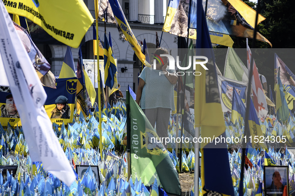 Ukrainians honor the memory of fallen soldiers on the Day of Remembrance of Ukraine's Defenders, amid Russia's attack on Ukraine, at Indepen...