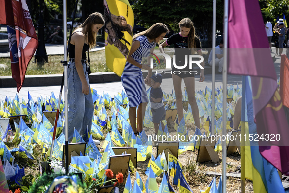 Ukrainians honor the memory of fallen soldiers on the Day of Remembrance of Ukraine's Defenders, amid Russia's attack on Ukraine, at Indepen...