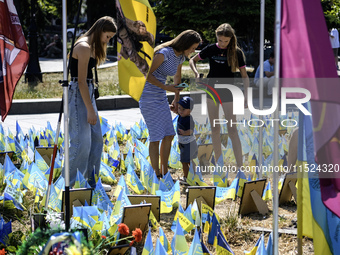 Ukrainians honor the memory of fallen soldiers on the Day of Remembrance of Ukraine's Defenders, amid Russia's attack on Ukraine, at Indepen...