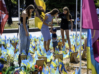 Ukrainians honor the memory of fallen soldiers on the Day of Remembrance of Ukraine's Defenders, amid Russia's attack on Ukraine, at Indepen...